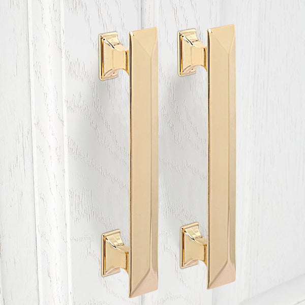 Loft97 HW347PLGD011 Tristan Pull Handle - Decorative Cabinet Drop Pull Handles for Cabinets and Drawers - Vintage Cabinet Hardware with Hand Finished Polished Gold - Metal Drawer Pull Handle, 3.75" Center to Center